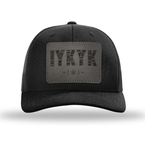 IYKYK 2A Leather Patch Black Trucker Hat